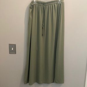 Pale green long skirt size large 12-14.  Tie front detail slits on both sides